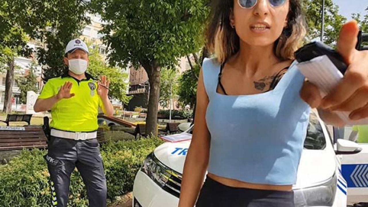 Sokağa çıkma yasağını ihlal eden kadın gazetecilere saldırdı
