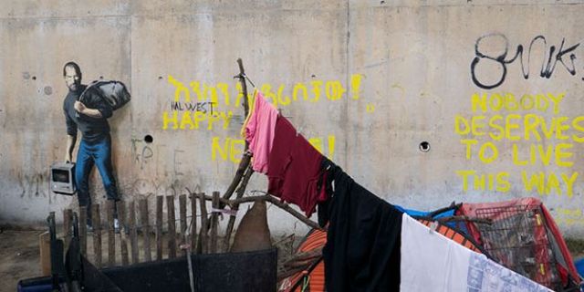 Mülteci sorununa dikkat çeken Banksy Suriyeli mülteci Stve Jobs'u çizdi