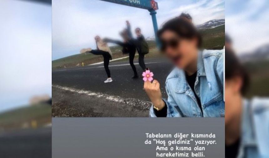 Türkçe-Kürtçe tabela önünde el hareketi yapan öğretmenlere soruşturma